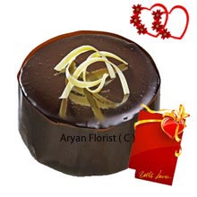 This 1Kg (2.2 Lbs) Chocolate Truffle Cake with a Valentine's Day Card is what you have been looking for if you go mad for chocolate. Made from pure chocolate cream and delicacy this gift will please your beloved in no seconds. Whether you like to send them at their door or reach them personally this piece of cake and greetings are surely going to make both of your days wonderful. Share happiness like there is no tomorrow.