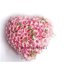 An annual celebration like Anniversary of your parents, friends, or your own self, buying flowers is inevitable as they make the occasion tender and fill emotions into it. A large heart shaped arrangement of 100 Pink Roses is all you need to surpass any other emotion. Celebrate with this arrangement and see your mother satisfied upon receiving this, see your friends happy and your wife proud, for carrying out the day with Roses arranged in heart shaped.