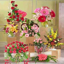 An attractive collection of mesmerizing floral luxury comes as an amazing present for special people nurturing bonds like never before. Be it any celebration, this whole package is made up of several arrangements of 50 Red Roses and 20 rare Pink Roses, three beautiful vases containing 6 Daisies and 6 Roses, 24 mixed color Roses and 12 Pink Roses respectively; accompanied with three bamboo Baskets each containing Assorted Flowers, 12 Red Roses, 10 Daisies and 10 Roses. It's going to catch all eyes of the room for sure.