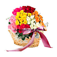 A hundred roses in a basket! This one is bound to leave your loved one ecstatic. Roses of different colours are handpicked by our expert florists and arranged in a beautiful composition to look like a large bloom. Fresh fragrance of a hundred roses can leave anyone mesmerized. The basket is made of soft but sturdy cane and is wrapped with a pink satin bow. Green and white filler leaves add to the volume and display.