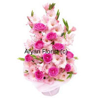 An outstanding combination of pink Roses with Gladiolus steal the heart at once. It's like love at first sight as the flowers are beautifully placed just like a royal carnation. If your loved ones live in a distant place, you must order this set of beautiful basket of flowers depicting the warmth with which you have sent them. The full bloom Gladiolus with big pink rose buds appear to smile back at you when you order them!