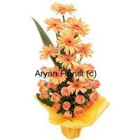 One of the most popular flower that is used for decoration in bunches, bouquets and carnations are the beautiful Gerberas. These orange Gerberas with Orange roses makes a heavenly looking set of cut flowers that are artistically placed. The orange colors of the flowers is emanating sunshine and the warmth of it. This beautiful carnation loudly conveys a message 'Let there be light', so it can be given to strengthen relationships. Place your order now!