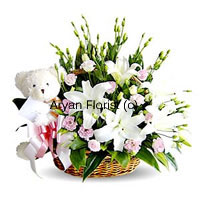 Mushy love is well represented through this beautiful basket of carnation and lilies. The innocent, cute, white little teddy bear that comes with this basket of flowers is the true reflection of what you feel for your love. The carnations are always the perfect choice for goodness and happiness, which are complimented by the serene lilies showing calmness along with passionate love. Place your order with us now and see your love manifesting into the truth.