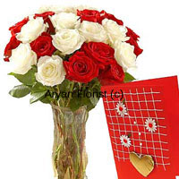 What happens when you put stunning red together with classy white? You get to express your emotions in the most exquisite manner. This bunch of 12 red and 12 white roses is beautifully arranged in a tall glass vase and comes with a complimentary greeting card. Sweet smelling and bountiful, it is designed by expert florists who have handpicked each rose to create a perfect gift. This one is sure to beautify every place and every occasion.