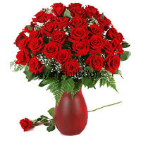Flaunting the richness of red, this bunch of 40 red roses specially arranged in a glass vase makes for an exquisite gift. Add to it fresh seasonal fillers and you have a gift you can never go wrong with. Grace occasions such as birthday, anniversary, baby shower and weddings with these roses. Easy to display and care for, the roses remain as fresh as they arrived for days to come.