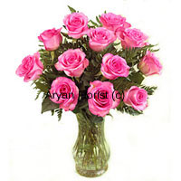 12 pink roses smelling as fresh as mist, this bunch in a vase makes for a sweet surprise for every occasion. Hand gathered roses from fresh farms and put together by expert florists, this bouquet is specially designed with ferns that add to the appearance. The glass vase adds to the classic look and feel of this bunch of pink roses. Surprise those who love pink!