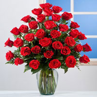 Three dozen roses are put together in a casual yet charming fashion in this arrangement. The 36 red roses are fresh and handpicked by expert florists. The glass vase is simple, yet elegant. Long stems of the roses are seen through the clear glass, adding style to this creation. The roses remain as fresh as they are in the farm. Mothers day, daughters day, birthday or a job promotion, gift this on any special occasion.