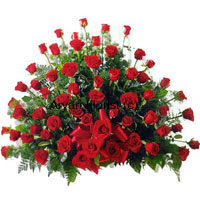 This basket is made up of 100 red roses. The bouquet is designed to give a natural look with all the 100 roses arranged to look like one large bloom. Green leaves add fresh nod to the arrangement, while the fresh misty smell of the red roses merges with the smells of the green leaves. With an appearance of abundance and a natural bouncy zing, this one is for those who like all things pretty. Order it for your ladies: mothers, sisters, wives and daughters love this one!
