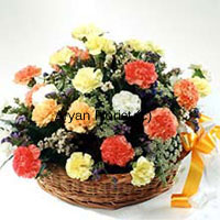 An adoring bouquet created with 24 mixed coloured carnations and seasonal fillers, this one is an absolutely stunning choice. Put together in a beautiful cane basket the carnations and fillers are playfully placed along with each other. Fancy ribbon tied to the basket completes the look. The flowers look and stay so fresh they remind of a garden.