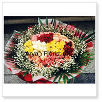 Make your present stand out with this bunch of 100 roses in mixed colours. The brightness of yellow, serene white, classic red and gorgeous pink, add a dash of colour and fragrance. Beautified further with fillers and ferns, the bouquet is round and surrounded with exotic leaves. A final layer of fancy wrapping adds style to this creation. Gift it on any occasion!