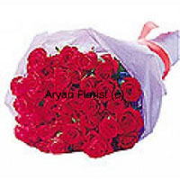 This bouquet of 24 red roses is specially created for congratulatory occasions. Bunched together in a beautiful manner and wrapped with fancy sheet, this abundant arrangement smells sweet and fresh. Arrange it creatively in a glass vase on a tabletop and it looks stunning and attractive. Send it on occasions such as anniversary, promotion, house warming and more.