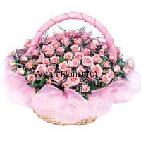 A Round Basket Of 50 Pink Roses With Seasonal Fillers