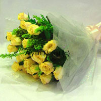 Easily a sunshine bouquet, this one will surprise and spread light all around your loved ones and friends. Crafted with 12 fresh yellow roses, seasonal fillers, green leaves and fancy wrapping material, this bunch is simple and elegant. Choose it for expressing your warm wishes for friends, family or business associates. This bouquet will surely brighten the world a little.