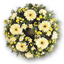 This gentle ring of white and yellow blooms will remind family and friends of all the fond memories. Gentle, soft and serene, the white flowers create a peaceful atmosphere. A lovely offering for condolence.