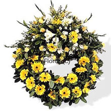 Pretty blooms in white and yellow are put together along with seasonal fillers and green leaves to create the most beautiful arrangement for offerings at a condolence meeting or funeral. Send this wreath to express your love, gratitude and condolence.