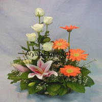 With a symbol of numerous emotions, this bunch of assorted lilies roses and gerberas laid on a bed of green leaves is a must give away rendering a beginning of a new life. This magnificent bouquet will work wonders when it is presented to the special person in your life. The green leaves are the base of this ultimate pack of flowers, showing strength and support in your life. Place your order now!