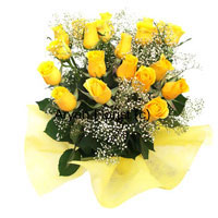 Bright like sunshine, this bouquet of two-dozen yellow roses is sure to spread happiness and joy. Fillers and green leaves punctuate the arrangement as the roses pop up randomly creating a fun vibe. Fancy wrapping to match the colour of the flowers creates an added vitality. Send these flowers on anniversaries and make life brighter.
