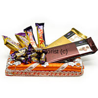 Sending only flowers? No time to buy gifts? This gift pack of assorted chocolates comes in handy and can be ordered along with the flowers. This accompaniment can be made on special days and festivals like Raksha Bandhan, Bhai dooj, Kid's Birthday's, welcome parties, house warming etc. Chocolates of good brands are sent along with the flowers, so be assured that the receiver will be pleased with this traditional way of showing care and fondness.