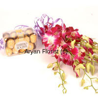 Bunch Of Pink Colored Orchids With Seasonal Fillers And A Box Of 16 Pcs Ferrero Rocher