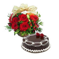 A fabulously special gift, this bunch of 12 red roses gets delivered with a 1 kg chocolate truffle cake. Fresh red roses gracefully bunch up along with green leaves and fillers in a basket that is decorated with fancy ribbon. A 1 kg chocolate truffle cake adds the element of sweetness. Send this to your friends and family to brighten up their day.