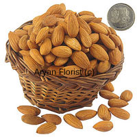 Send this lovely gift of 250 grams almond and a Lakshmi Ganesh silver coin to your friends and family on festive occasions. The best quality almonds are selected and put together in a basket. The Lakshmi Ganesh coin adds auspiciousness. A perfect way to send your good wishes.