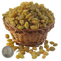 Send this gift of 250 grams raisins and one Lakshmi Ganesh silver coin to celebrate festive occasions. The best quality raisins are neatly packed in a cane basket and wrapped with fancy paper. The silver coin adds the element of auspiciousness and good wishes.