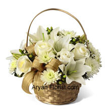 With the serenity and peace of white, this arrangement comes in white beauties, such as roses, chrysanthemums, and Asiatic lilies. The color of the arrangement is contrasted well with that of the basket which is gold in color. The look of the entire package of flowers and basket together is absolutely tranquil and sends a message to maintain that perpetually. The green colored hypericum berries and a gold plaid ribbon makes this arrangement stand out, especially due to its subtlety and vibrancy at the same time. (Please Note That We Reserve the Right to Substitute any Product with a Suitable Product of Equal Value in Case of Non-Availability of a Certain Product)