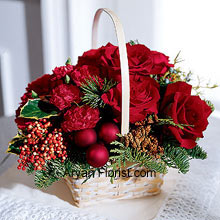 In this season rife with festivities, this attractive arrangement with roses and Christmas greens is the superb way to feel the festivities. The panache this arrangement evolves is totally admirable as it has the classic Red Roses that are tastefully decorated holiday greens and berries. The basket is adorned very beautifully with these items and make it a perfect gift or self-buy. Place an order now and glare at the lovely roses!! (Please Note That We Reserve the Right to Substitute any Product with a Suitable Product of Equal Value in Case of Non-Availability of a Certain Product)