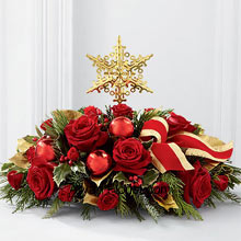 Decoration with dazzle, stars, flowers and much more is all in this season of Christmas. This centerpiece is a judicious mix of all these brought together in one. We present to you the Star, indicating the birth of a heavenly body and its presence in your abode and the rich red roses and spray roses surround the start like they are welcoming the coming of this divine body, on to this earth. This centerpiece is purely an exact replica that is behind the spirit of this season. (Please Note That We Reserve the Right to Substitute any Product with a Suitable Product of Equal Value in Case of Non-Availability of a Certain Product)