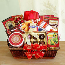 It is indeed a wonderful feeling when you receive a basket of chocolates and cookies to savor during tea time and at all happy times! So, gift this gourmet basket that can be presented on any occasion and savoured anytime. The basket is very well decorated with the lovely bow to enhance to the festivities and includes: Walker's holiday shortbread cookies, Ghirardelli chocolate assortment, Jelly Belly jelly beans, butter toffee pretzels, truffle cookies, cheese swirls, smoked almonds, cheese, English tea cookies, water crackers, and a Ghirardelli chocolate bar. (Please Note That We Reserve the Right to Substitute any Product with a Suitable Product of Equal Value in Case of Non-Availability of a Certain Product)
