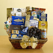 Just like height of an altar, this basket has tortilla chips, salsa, cheese sticks, brie cheese, water crackers, smoked salmon, pistachios, almonds, popcorn, pretzels, cheese swirls, Jelly Belly jelly beans, assorted Ghirardelli chocolates, wafer cookies, a tin of chocolate-covered sandwich cookies, a bag of Ghirardelli squares, and biscotti, arranged vertically, giving this pack a majestic look. This is apt to present to your boss, sister or brother, this will please all. From children to adults everyone will enjoy the crunchy-munch gift basket adorned with bows and other decorative items. (Please Note That We Reserve the Right to Substitute any Product with a Suitable Product of Equal Value in Case of Non-Availability of a Certain Product)