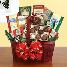 Packed in a stupendous way, the split wood handle basket is presented to you to savor the wonderful chocolates. These are put together in this basket to bring the smile to your receiver's face and the beam will enlighten your life too. This red colored basket is decorated with a ribbon bow and contains two gift bags of Ghirardelli squares (mint chocolate & dark chocolate), truffle cookies, a caramel chocolate bar, hot cocoa mix, and an assortment of Ghirardelli chocolate squares. (Please Note That We Reserve the Right to Substitute any Product with a Suitable Product of Equal Value in Case of Non-Availability of a Certain Product)