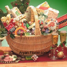 The magnitude of this basket, is as large as that of your relationship with your sibling. This elegant basket with lots of goodies will entice your sister/brother. The basket contains Starlite Mints in a Happy Holidays theme bag, 4 oz. Butter Toffee Pretzels, 3 oz. Peanut Butter Filled Delights, 3 oz. Caramel Filled Holiday Chocolates, Sara Sweets Box of Holiday Sugar Plums, 3.75 oz. Old Fashioned Chocolate Walnut Fudge, Old Fashioned Peanut Brittle, 2.25 oz. Peppermint Bark Bar, 4 oz. Old Fashioned Holiday Ribbon Candies, 5 oz. Beef Salami, Wisconsin Cheddar Cheese Round, Costa 8 oz. Wheat Crackers, Grained Mustard, Dolcetto's Cream-Filled Pastry Roll Cookies, 8 oz. Holiday Blackberry Jam, Sparkling Apple Cranberry Cider, Gourmet Holiday Coffee Blend and Holiday Traditions Assorted Holiday Cocoa. (All these products are subject to availability and are replaced with goodies of equal value).